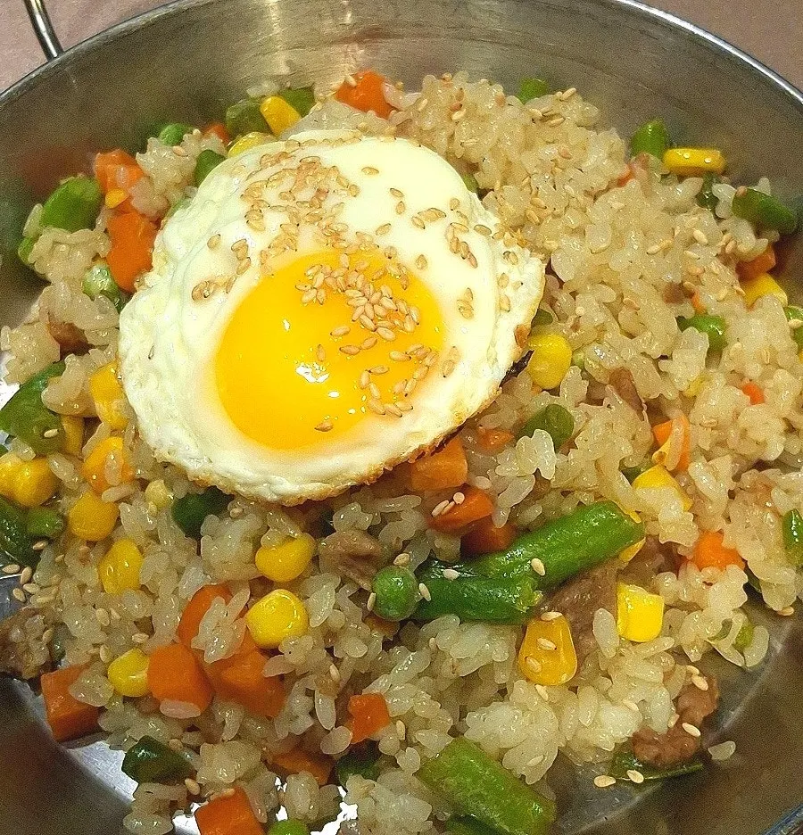 Gukgojip's beef fried rice topped with a fried egg