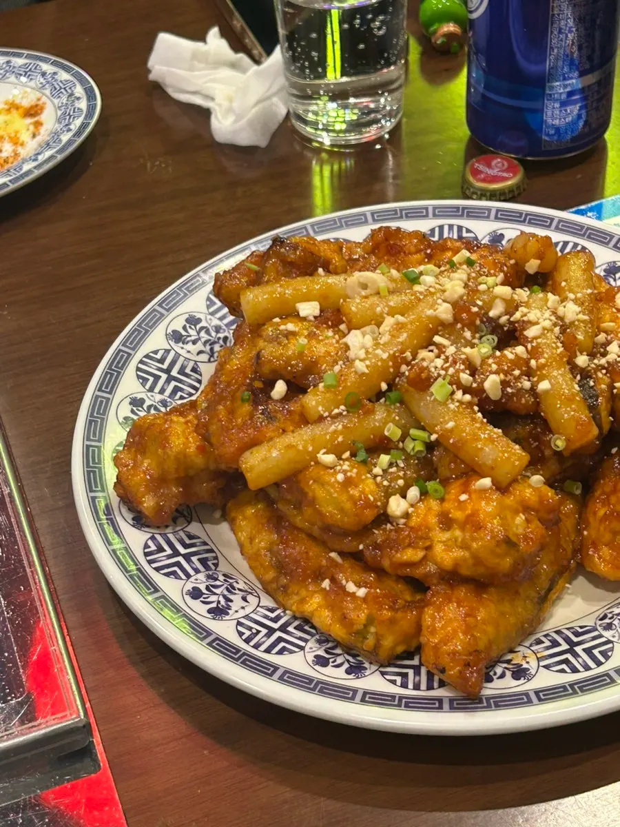 Table spread of lamb skewers at Gukje Yangyukgwan