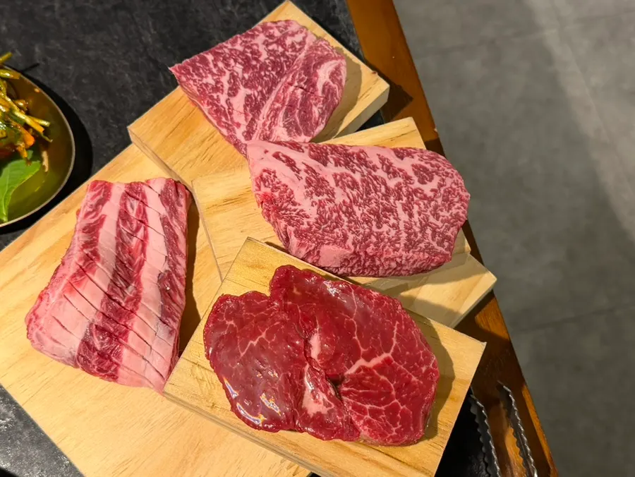 Sign noting tenderloin, sirloin and other grade 1 hanwoo cuts