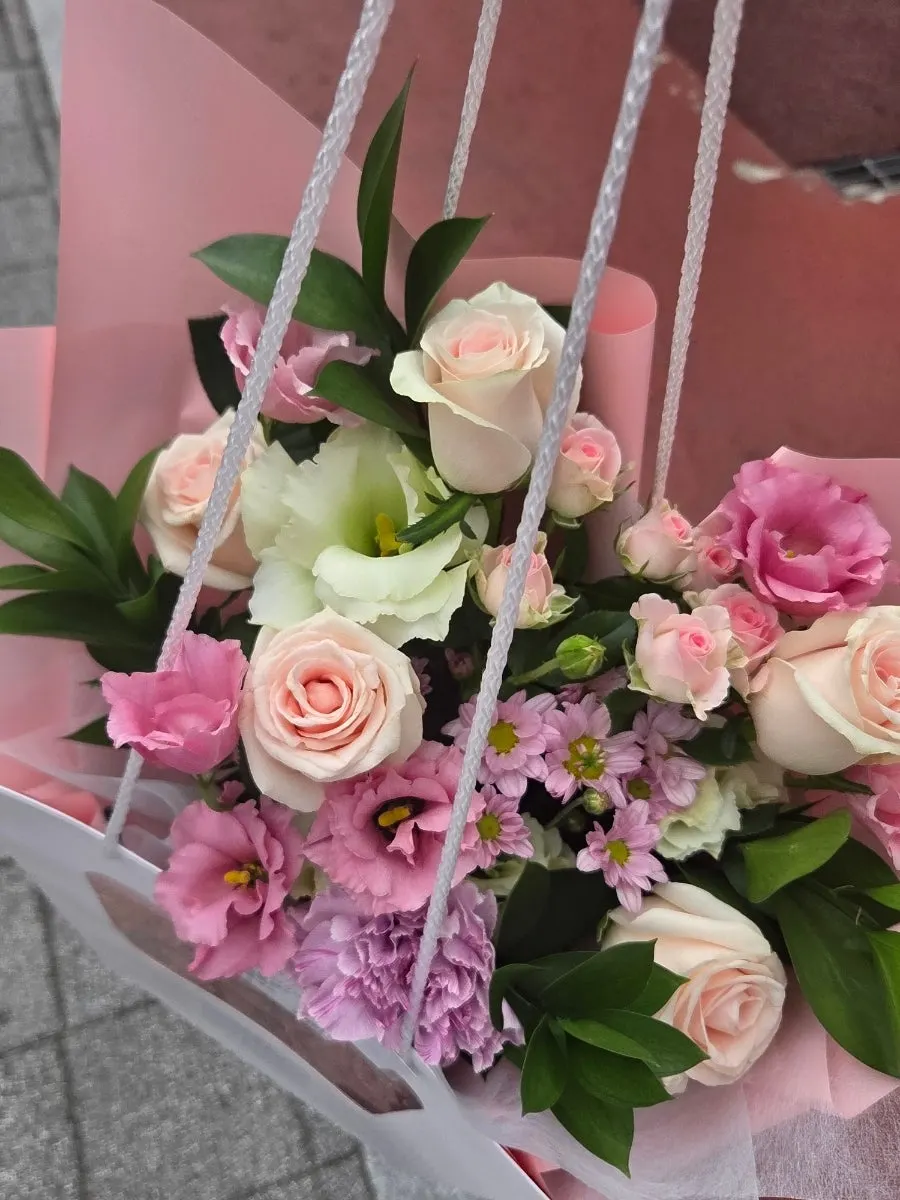 Bouquet packed together with the flower bag