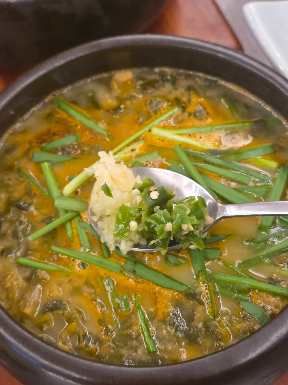 Turmeric rice served with loach soup