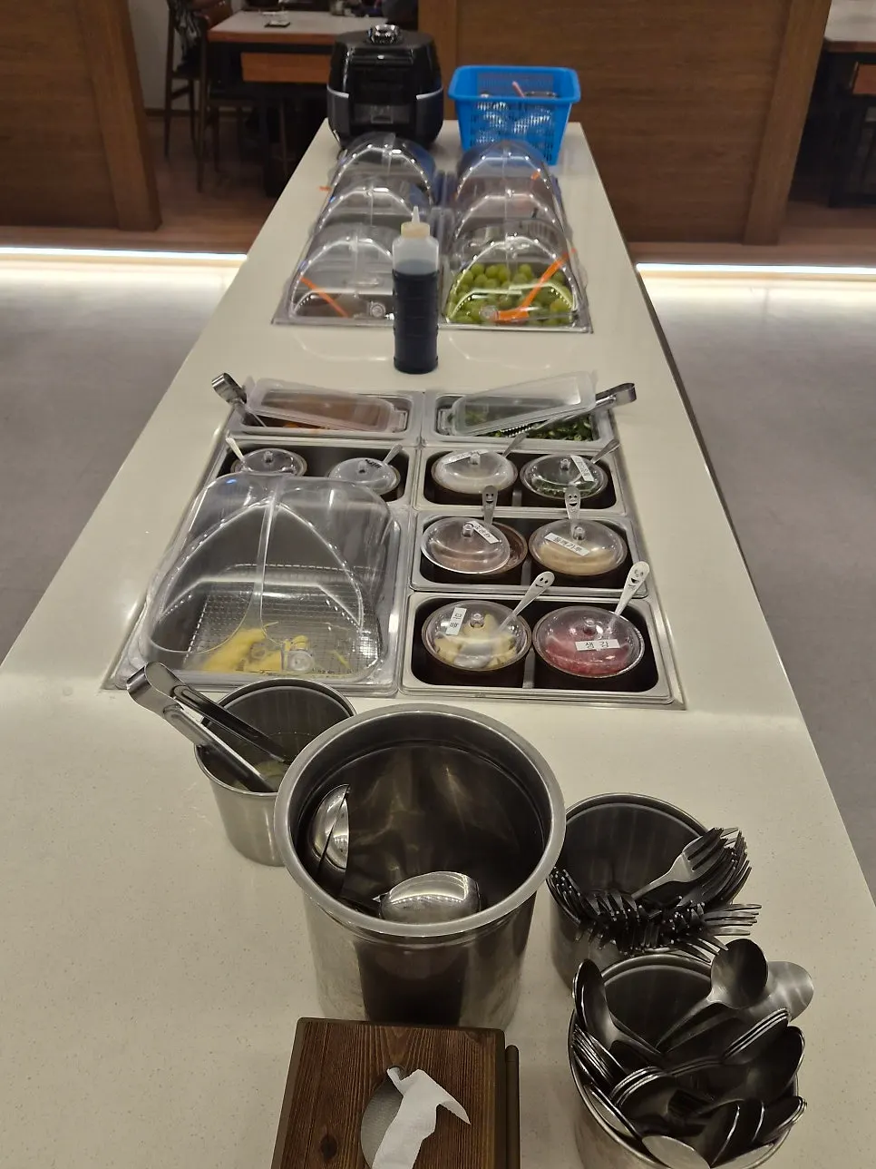 Irojeong's self-serve bar with noodles and fruit