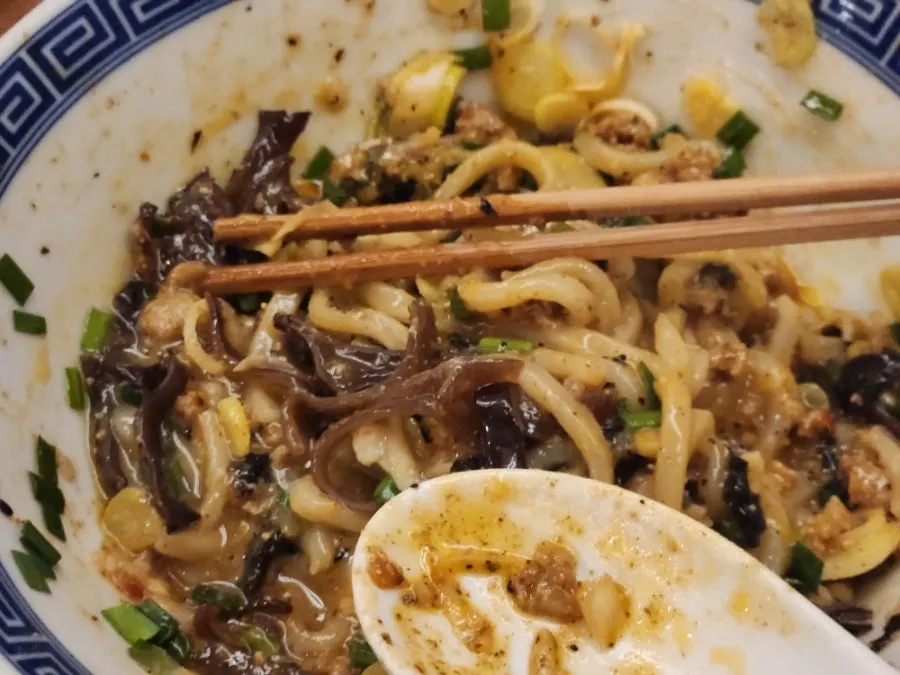 Mazesoba mixed together with the egg yolk