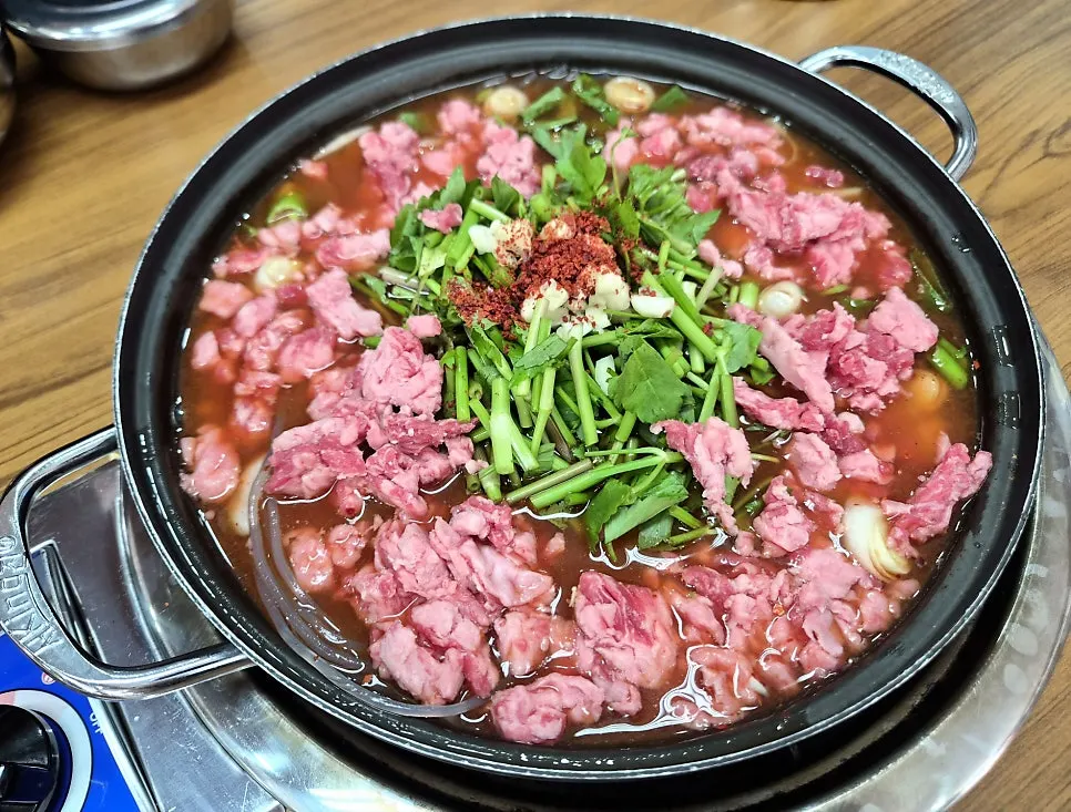 Korean beef so-jjigae with Korean side dishes