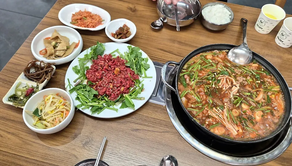 So-jjigae broth with Korean beef and minari