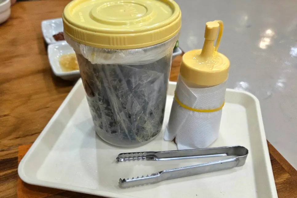 Porridge served as an appetizer with seaweed flakes
