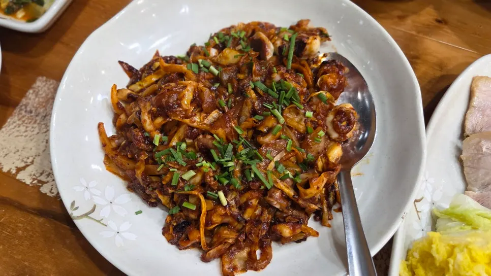 Plate of spicy grilled octopus stir-fry