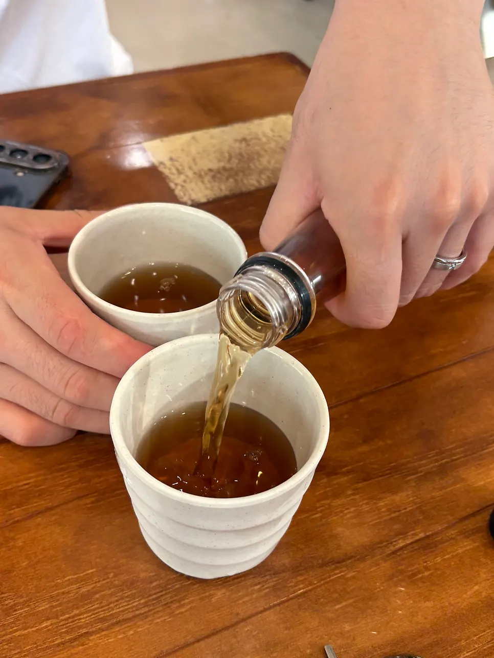 Cool barley tea served as a starter