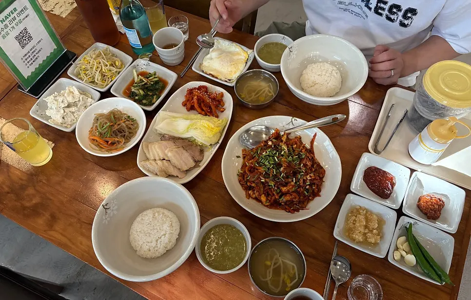 Full spread with grilled octopus stir-fry and bossam