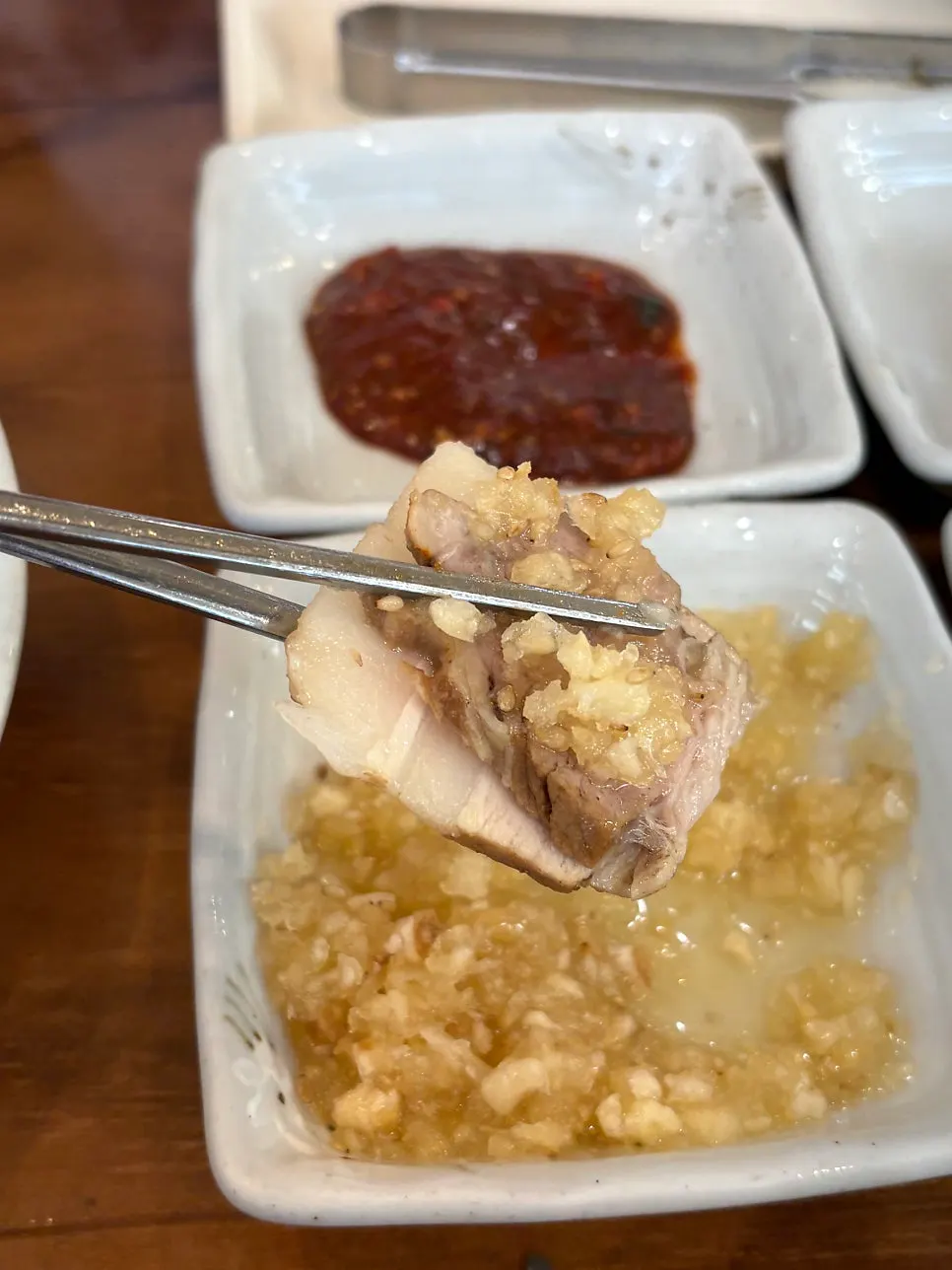 Herbal medicinal bossam with garlic sauce and salted hairtail intestine sauce