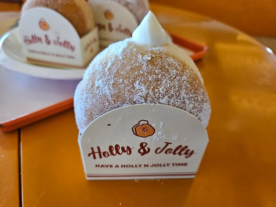 Cross-section of an Otters cream doughnut cut in half