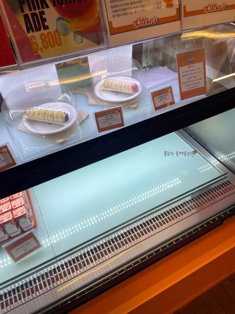 Dessert showcase at a large bakery café