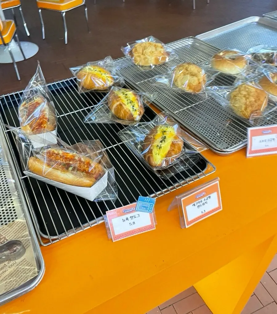 Donuts overflowing with cream on display
