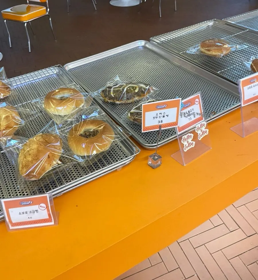 Close-up of the Otters donut display case