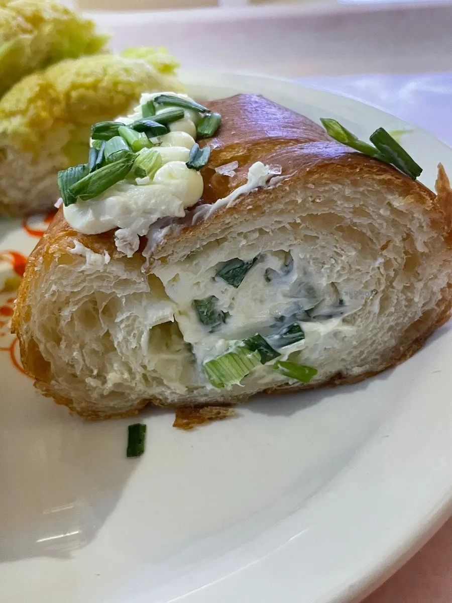 Cross-section of melon cream bread full of cream