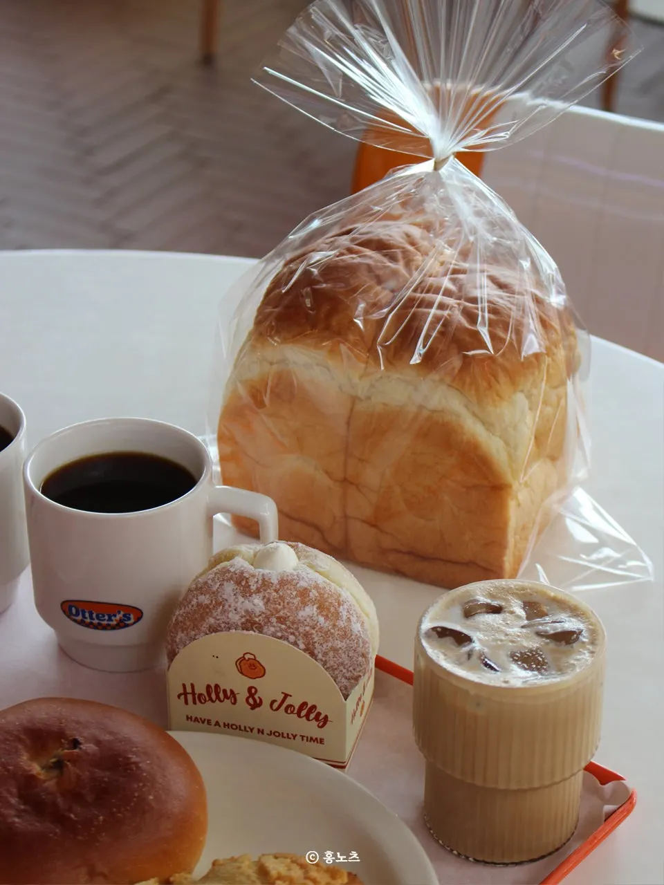 Table spread of bakery items and drinks