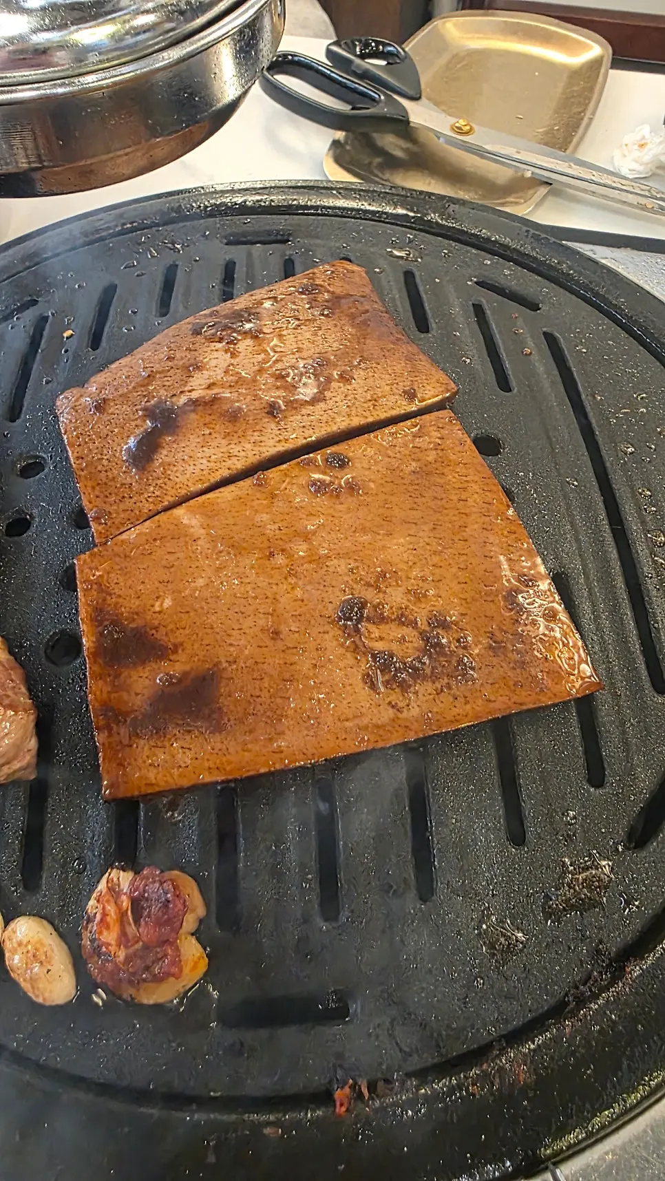 Close-up of a piece of charcoal-grilled meat