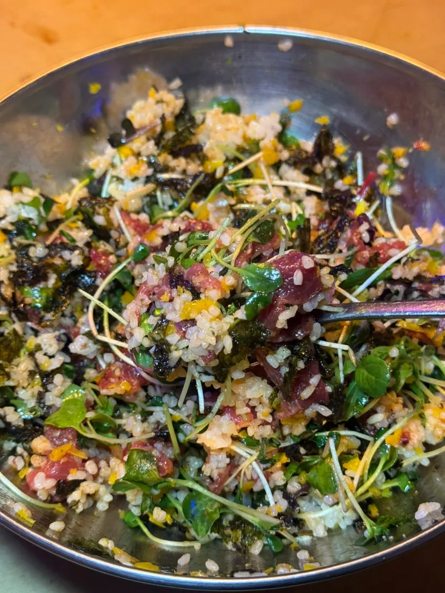 Yukhoe bibimbap mixed with seaweed flakes and vegetables