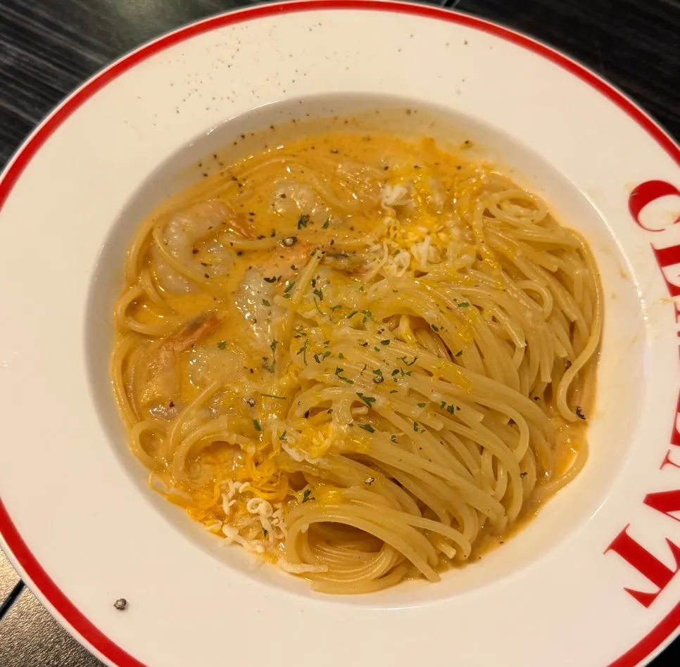 Salchi garlic oil pasta topped with salchisal