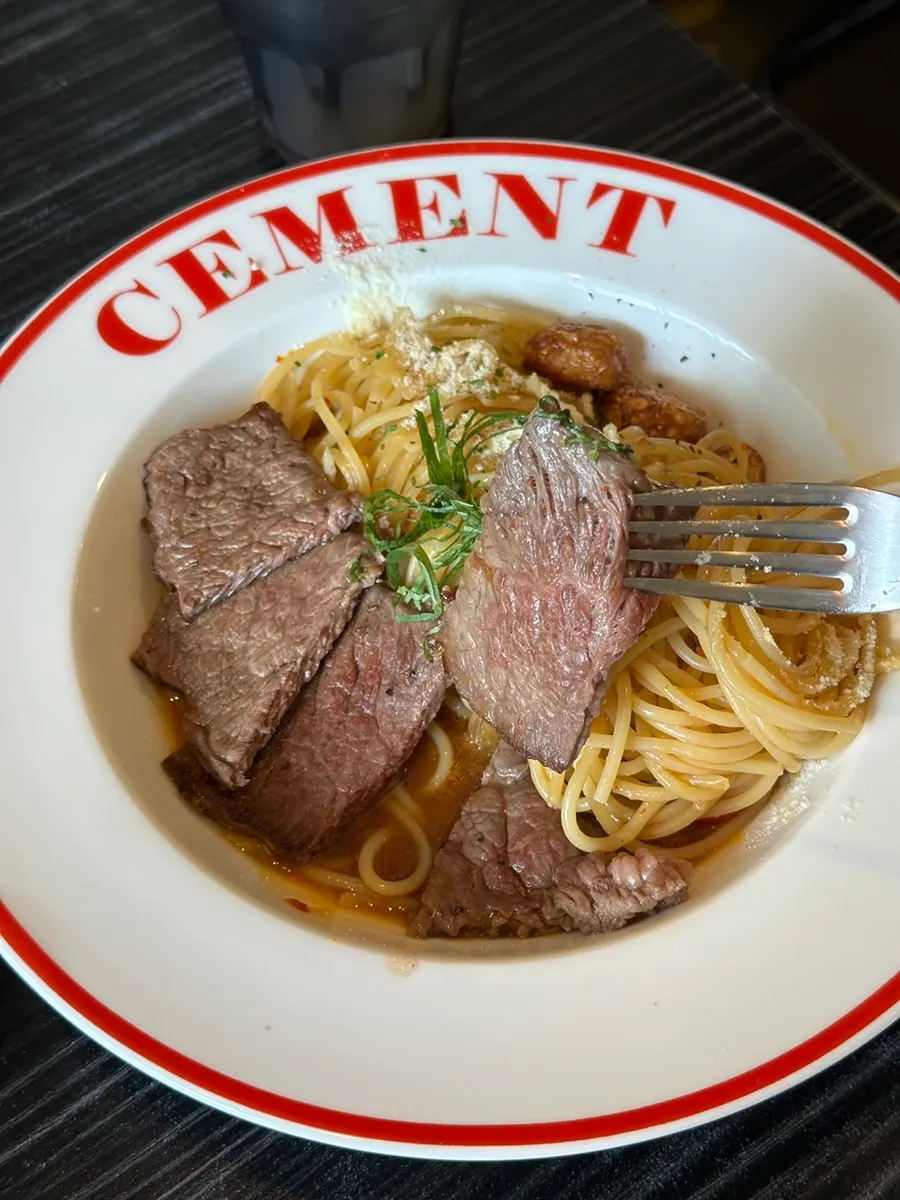 Pasta showing a thick chunk of striploin