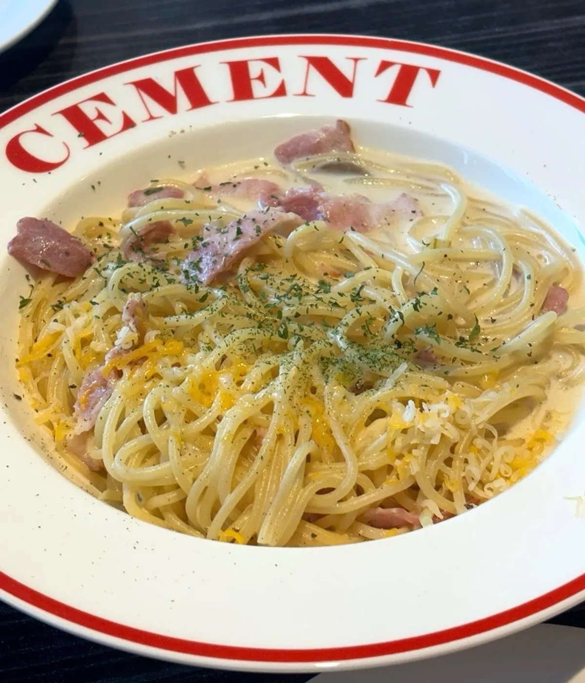 Tableware printed with the Ciment lettering