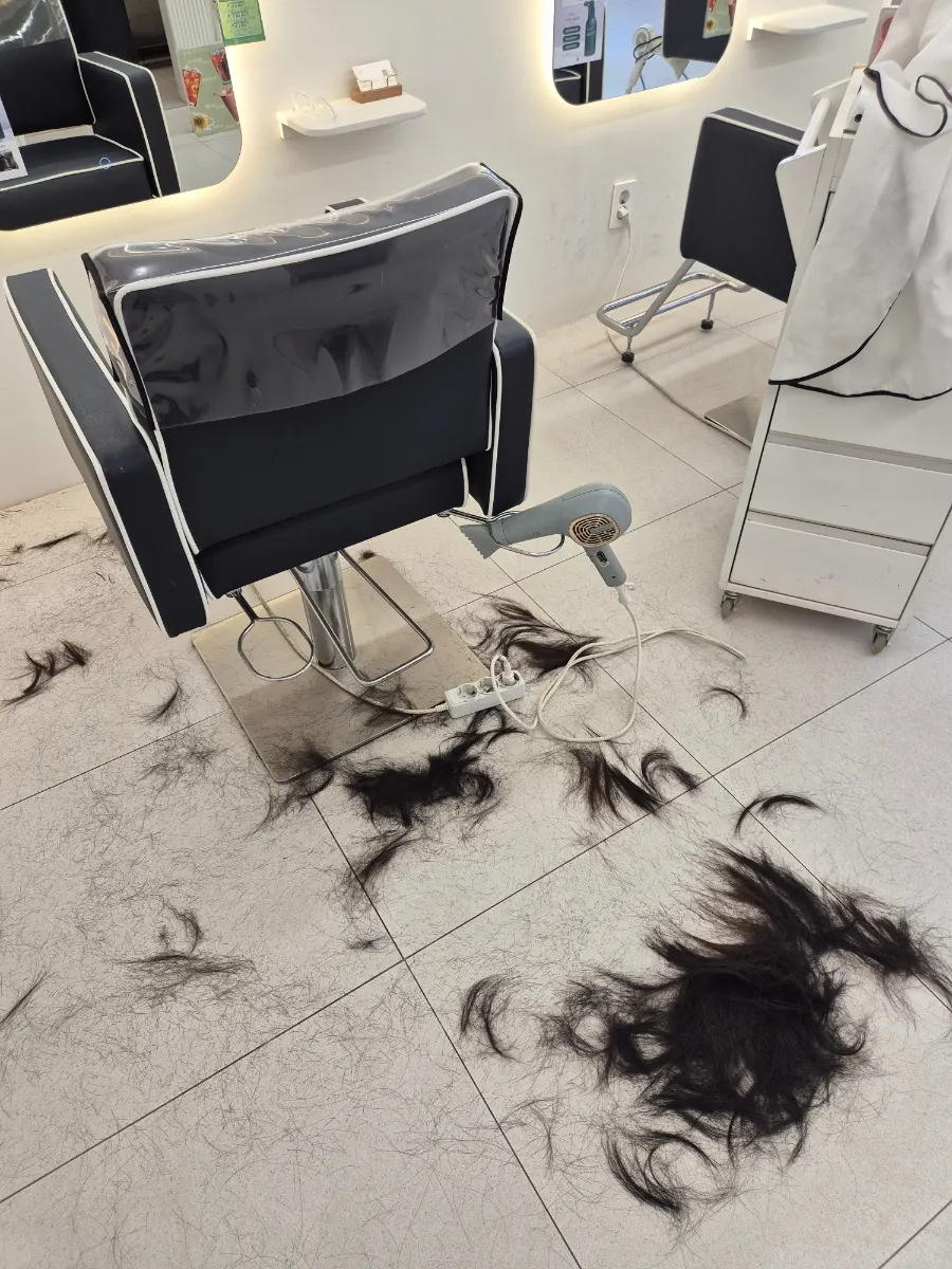 Cut hair fallen on the floor after the trim