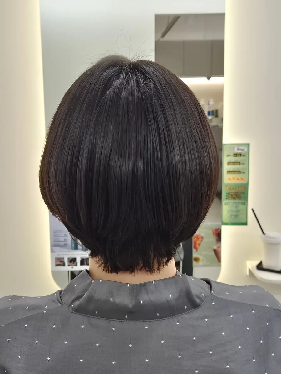 After photo of the completed short bob volume magic perm