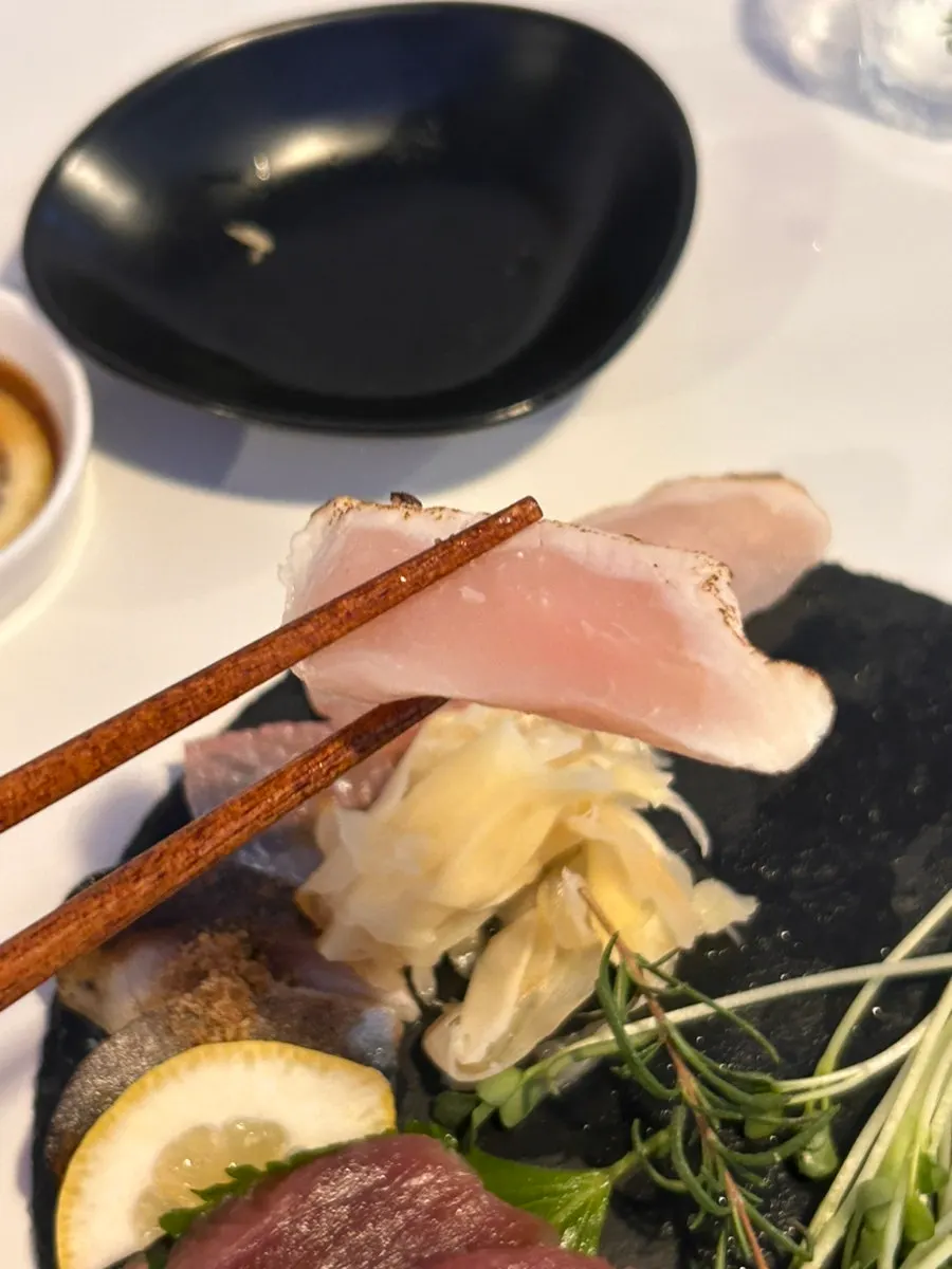 A piece of aged flounder sashimi