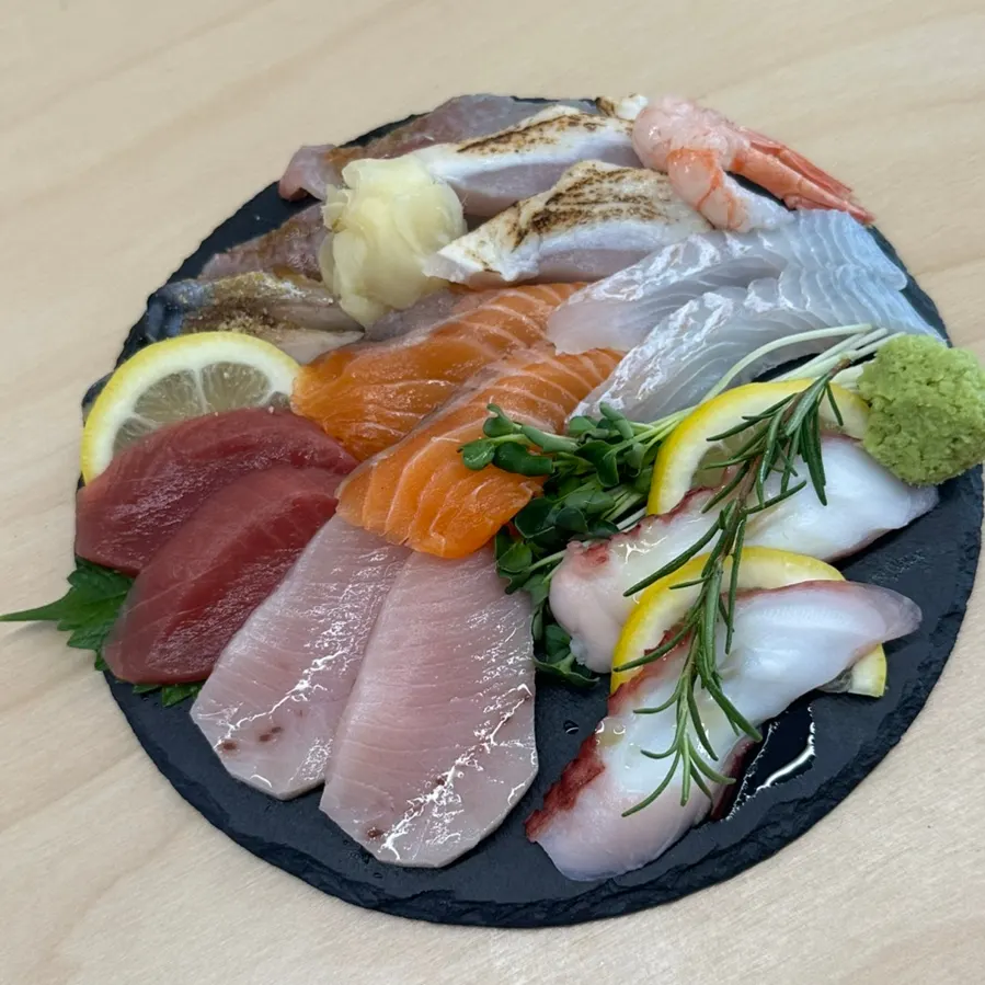 Neatly arranged sashimi plate