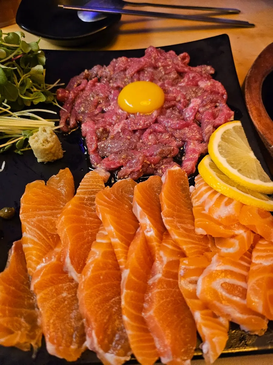 Rice ball topped with wasabi and beef tartare