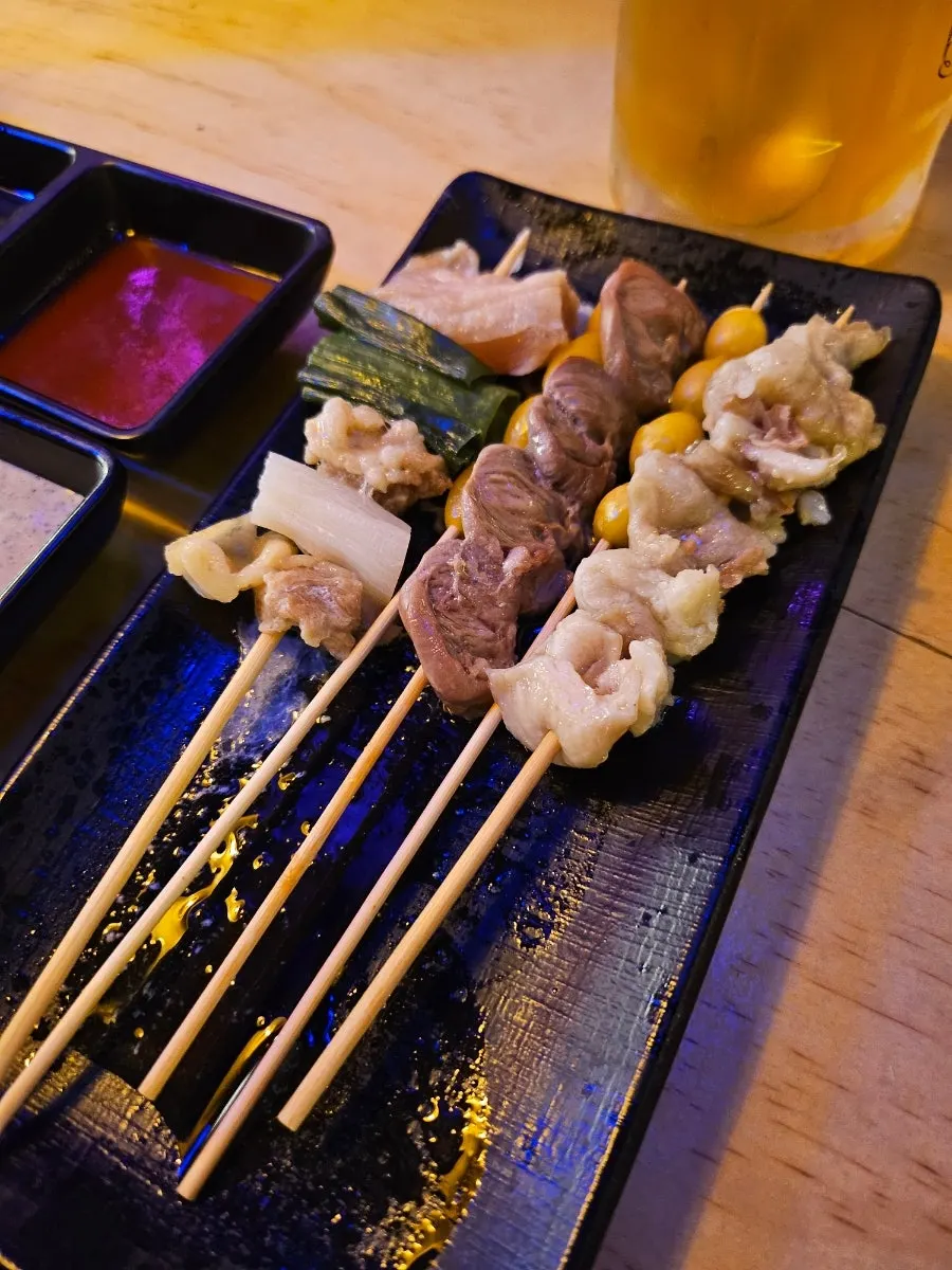 A bite-sized rice ball topped with beef tartare