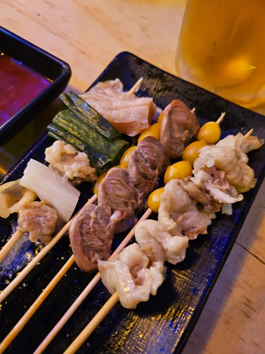A drinking spread featuring beef tartare and salmon