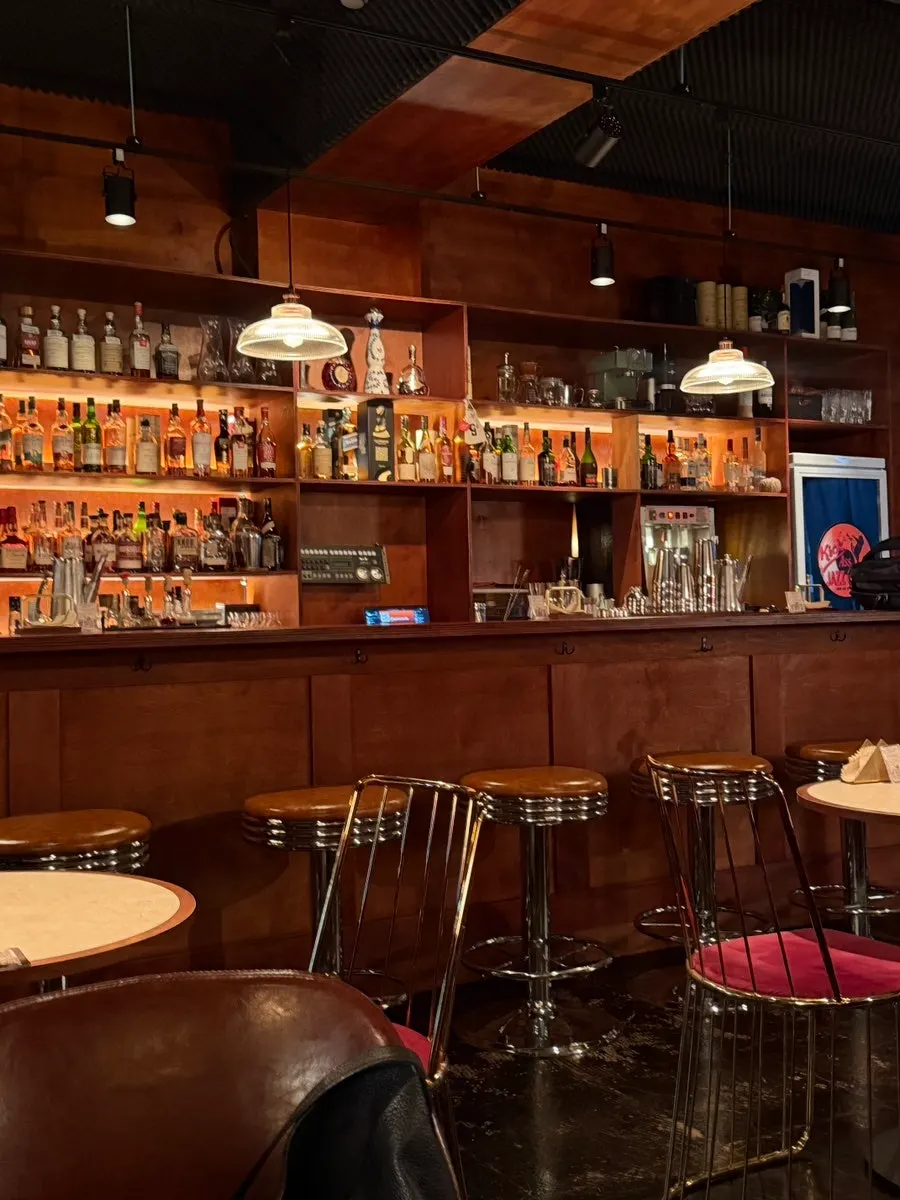 Brown wooden walls and bar table