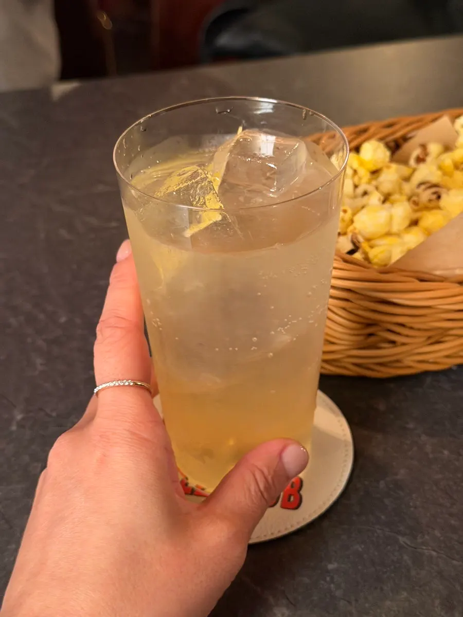 A non-alcoholic cocktail and a highball side by side