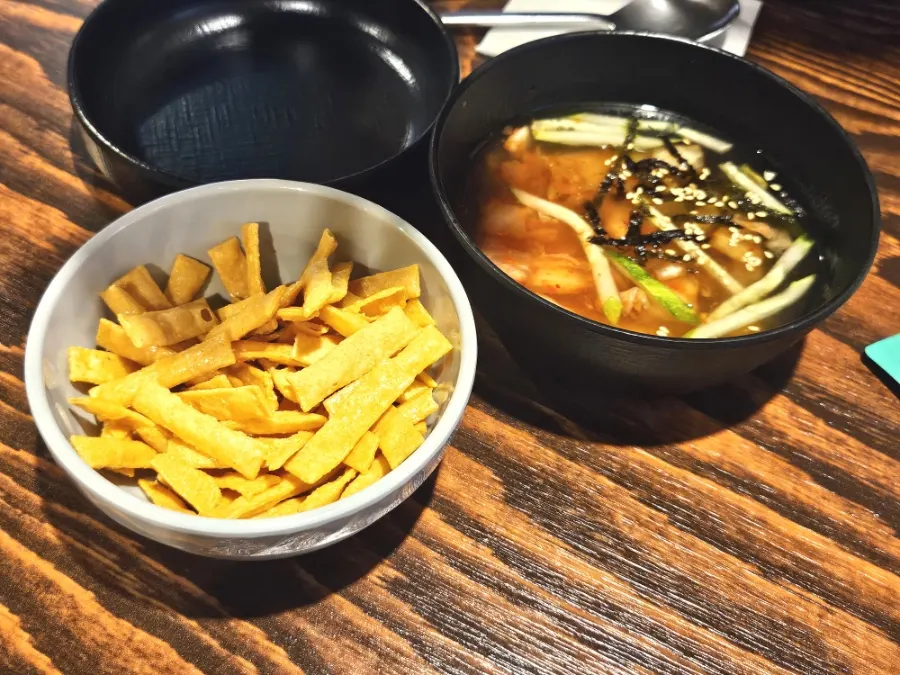 A spread of basic side dishes at Saechamjip
