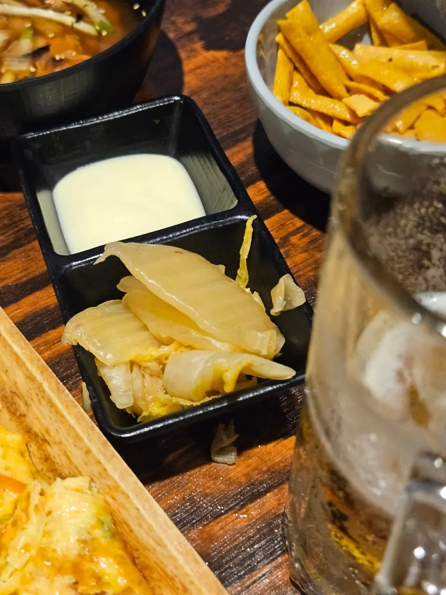 Bone grill served with baek-mukeunji aged kimchi