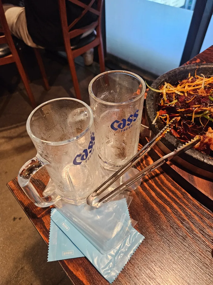 A glass of Cass ice draft beer
