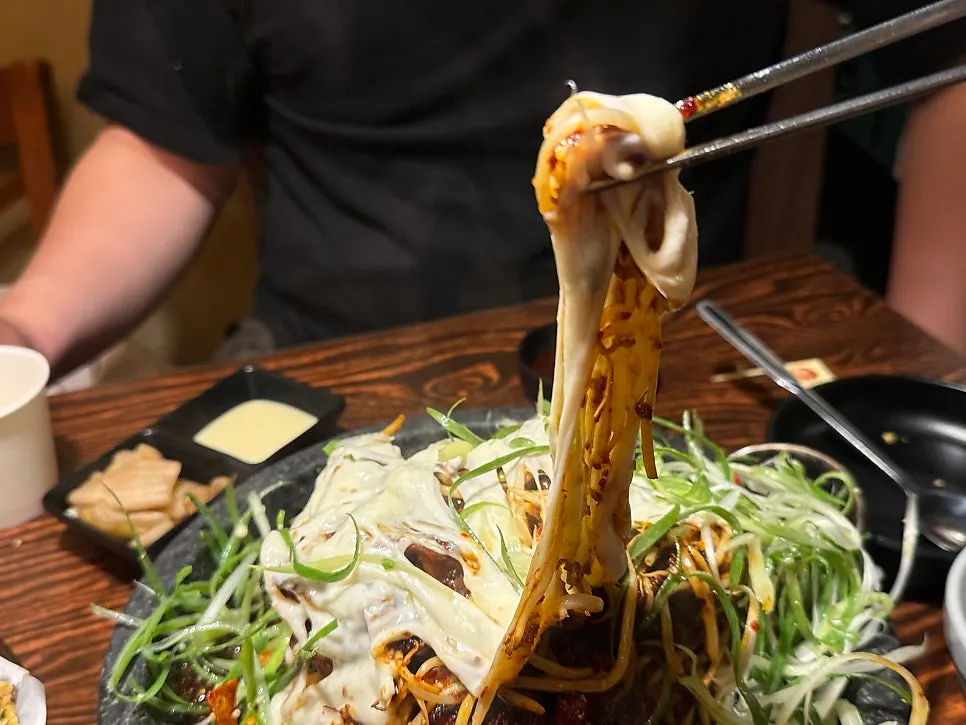 Stretchy cheese pulled from the bone grill