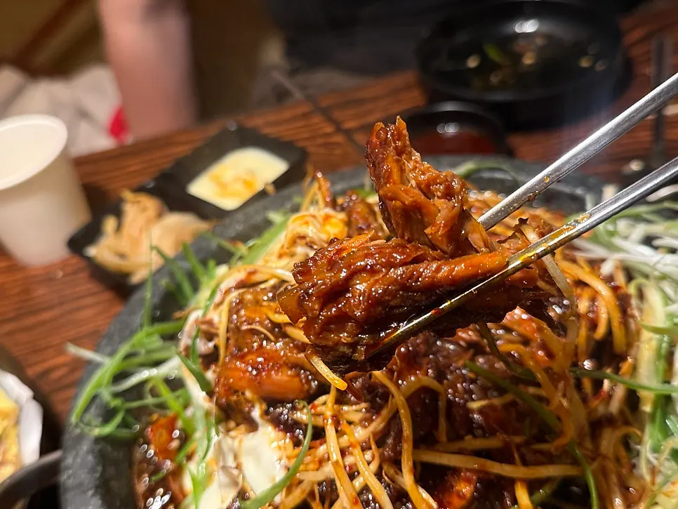A bite of boneless meat and scallions