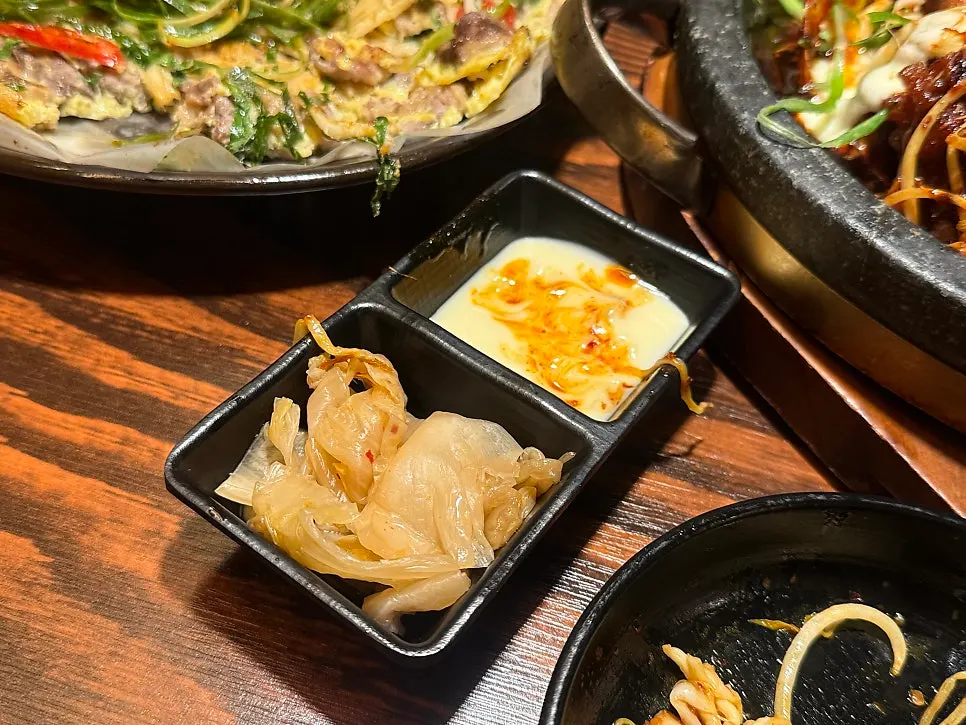 Bone grill wrapped in white kimchi with mayo sauce