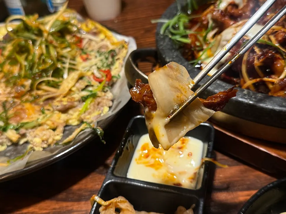 A piece of boneless bone grill with white kimchi