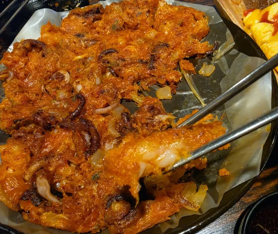 A plate of octopus-shrimp kimchi pancake