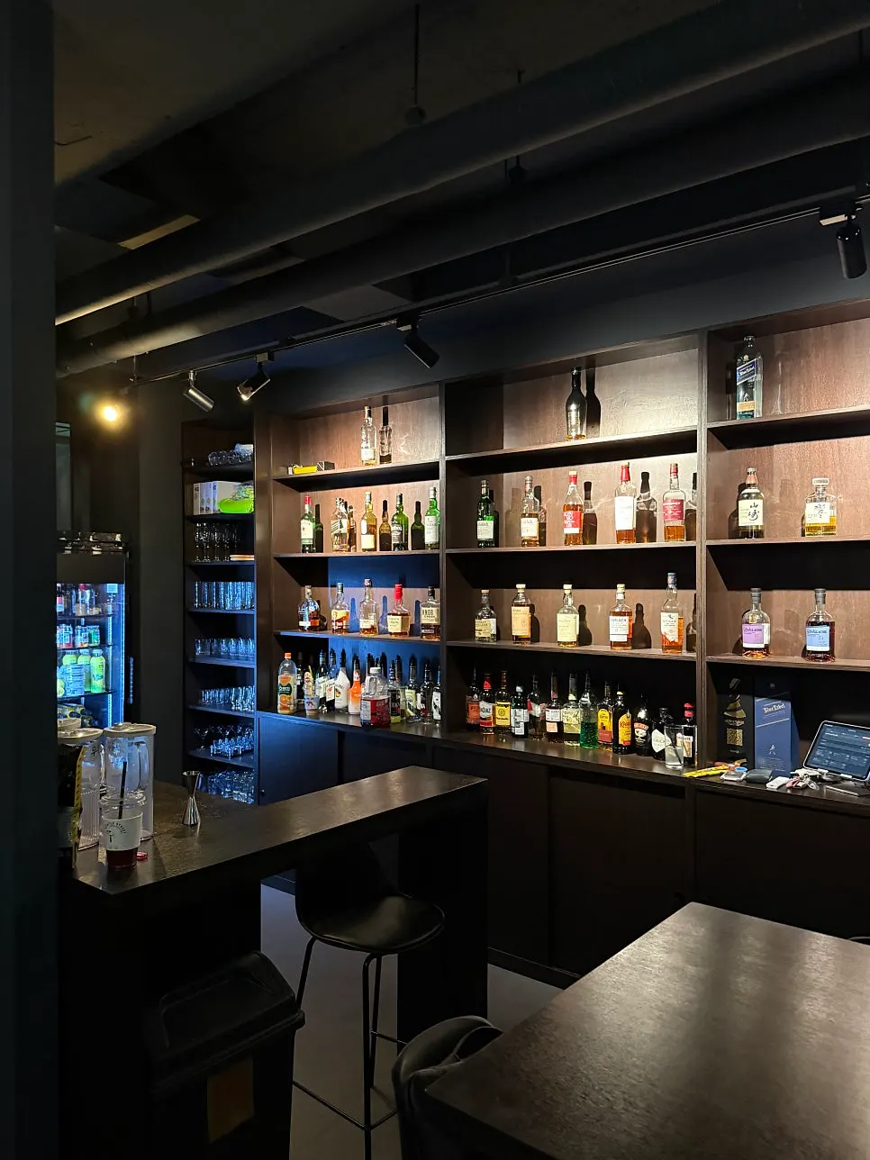 Dimly lit bar-style interior