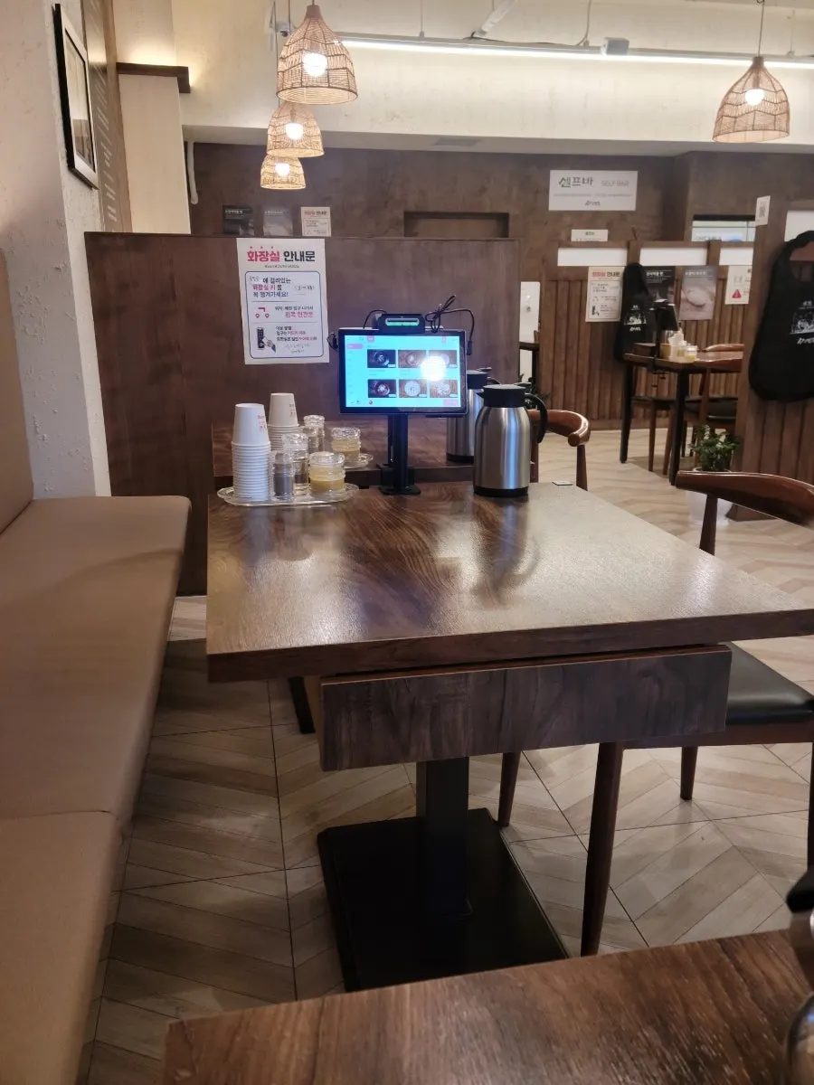 Sosa Myeonok seating with generously spaced tables