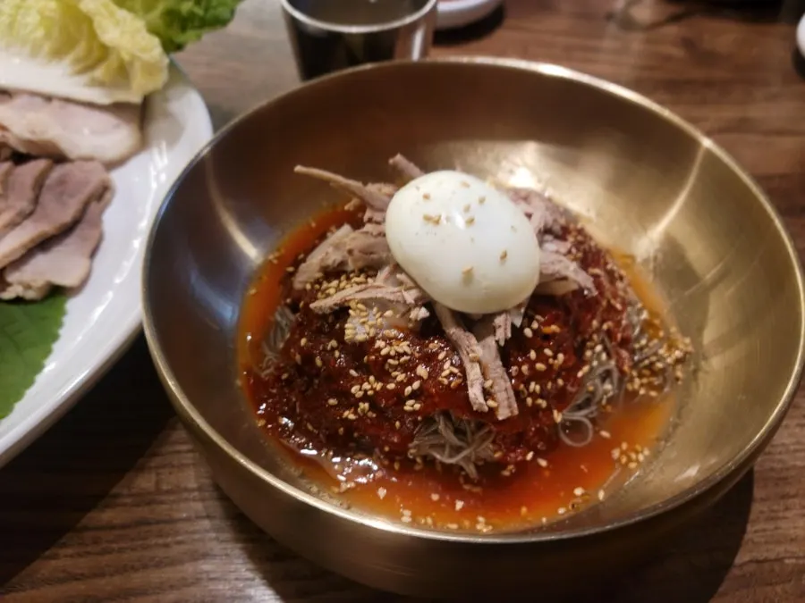 Noodles tossed in sauce for bibim naengmyeon
