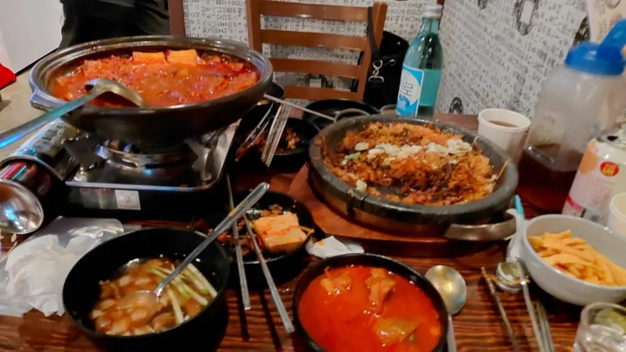 Full table view of the drinking spread at Saechamjip near Gunja Station