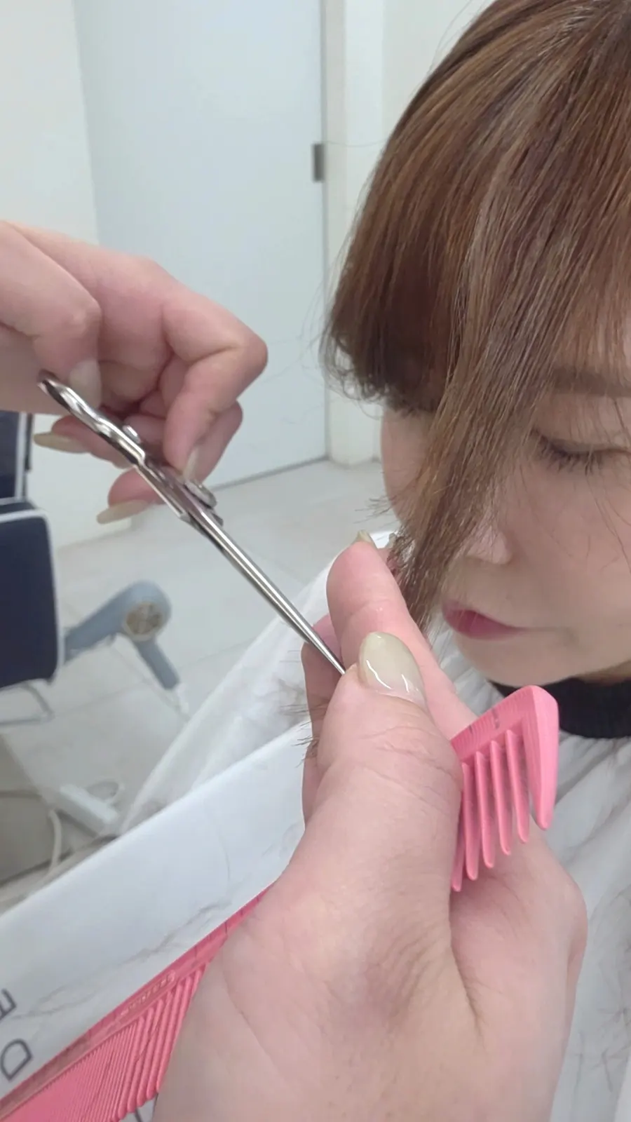 Mid-length layered cut in progress
