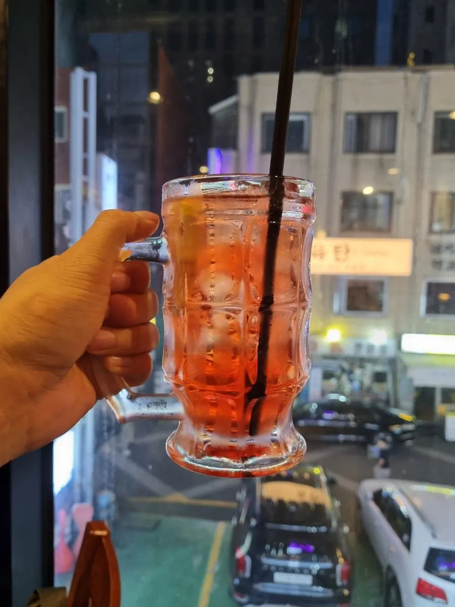Pomegranate highball with bone grill