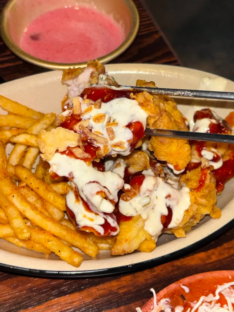 Spicy mayo boneless fried chicken served with cabbage salad