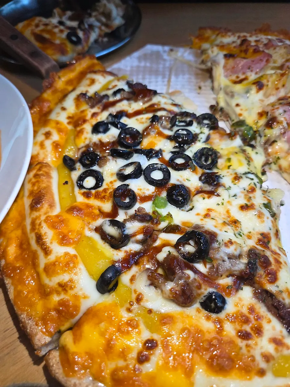 A slice of old-style galbi pizza